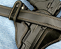 Close view of the finely stitched leather dress belt and custom IWB Gun Holster