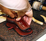 We custom make leather gun holsters and western gun holsters.