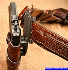 Sheriffs duty belt western style for a colt 1911 pistol and gun belt