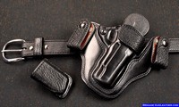 Custom M-11 Gun Holster, belt and matching pouch with black shark trim.